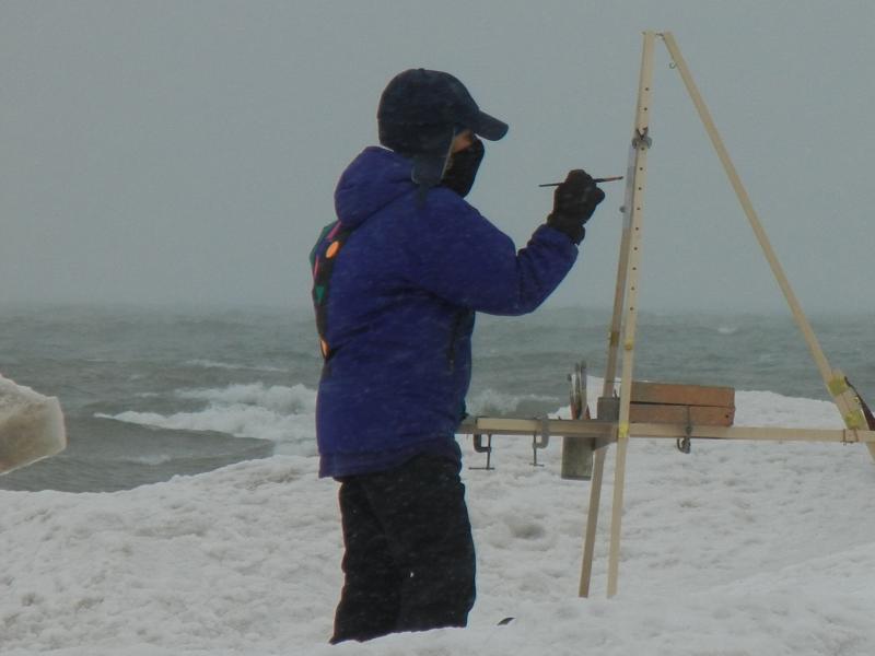 Lynn Rix painting in the snow with her Take It Easel